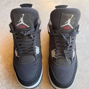 Authentic Jordan 4 black canvas
